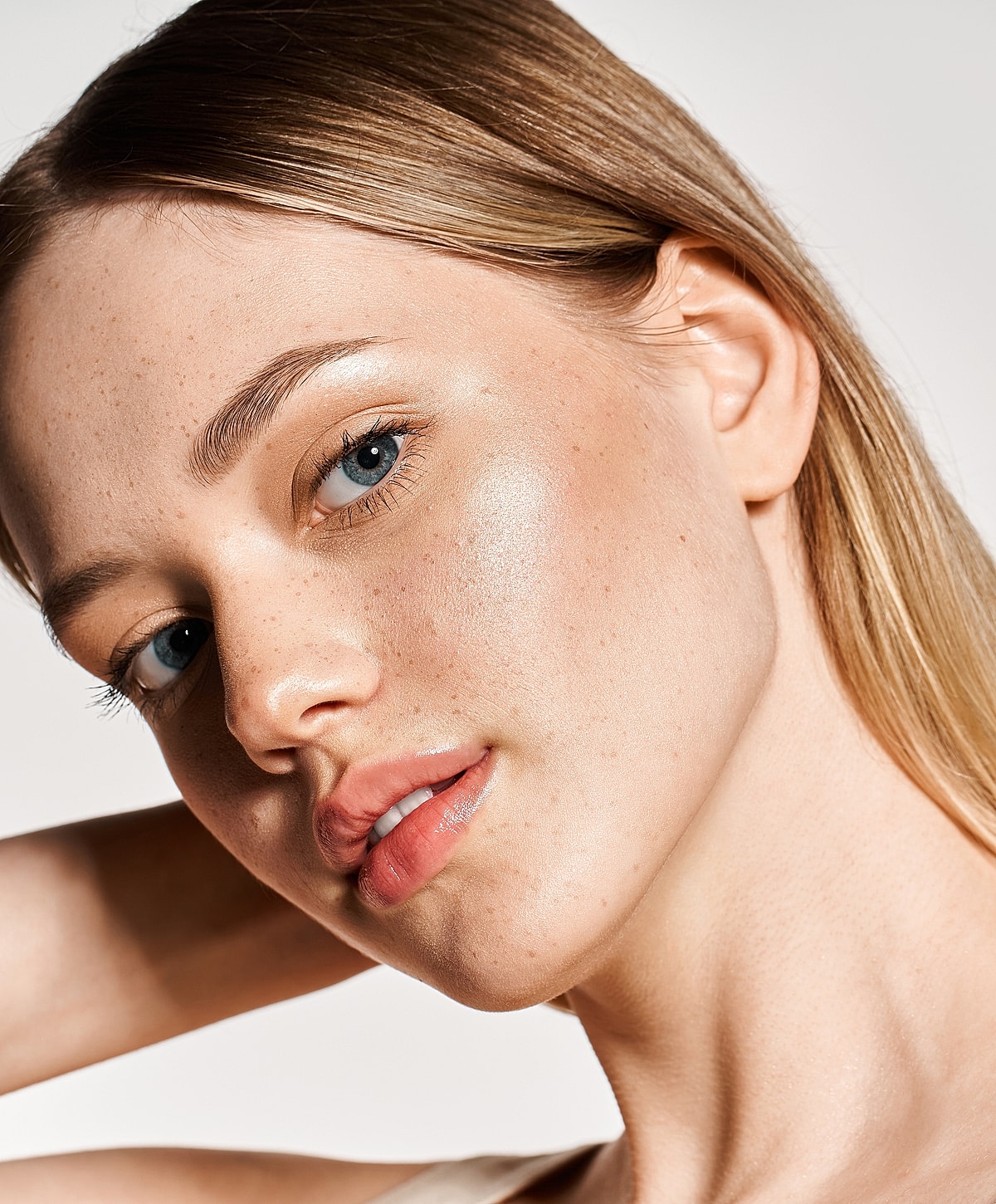 Close-up of woman with natural beauty and freckles